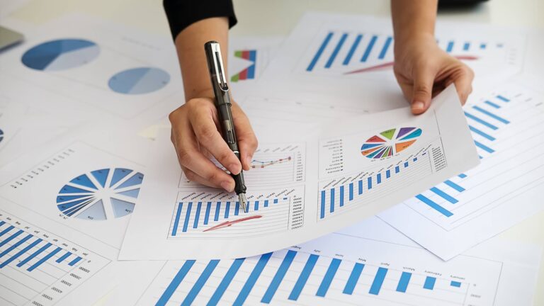 A woman working on results from a data-driven marketing campaign